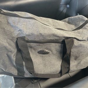 Bob Mackie duffle travel bad with dress bag